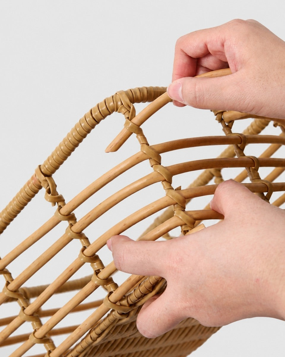 Close view of handmade faux rattan woven basket texture