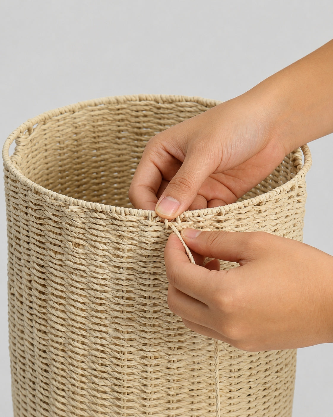 Close up view of handwoven paper rope laundry basket texture