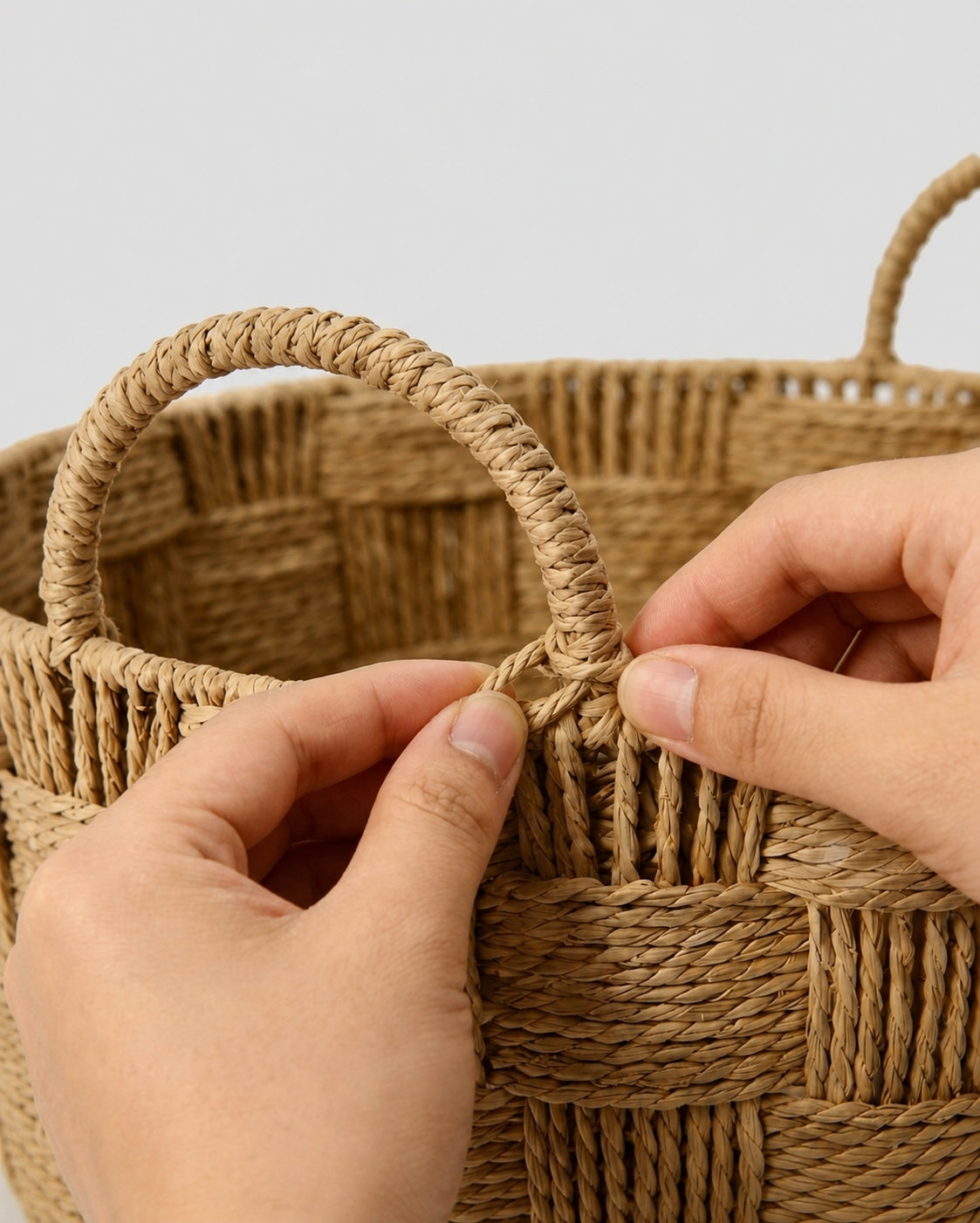 Close up view of handwoven paper rope laundry basket texture