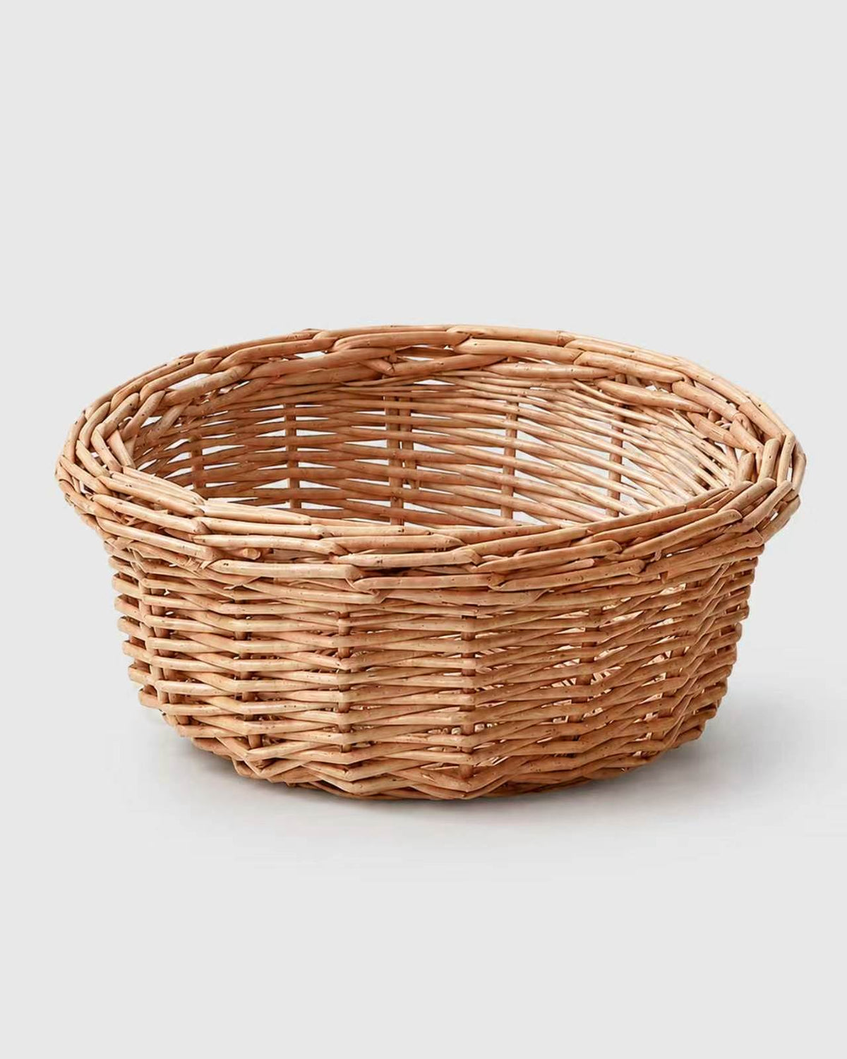 Mona round faux rattan fruit storage basket with a natural brown woven finish