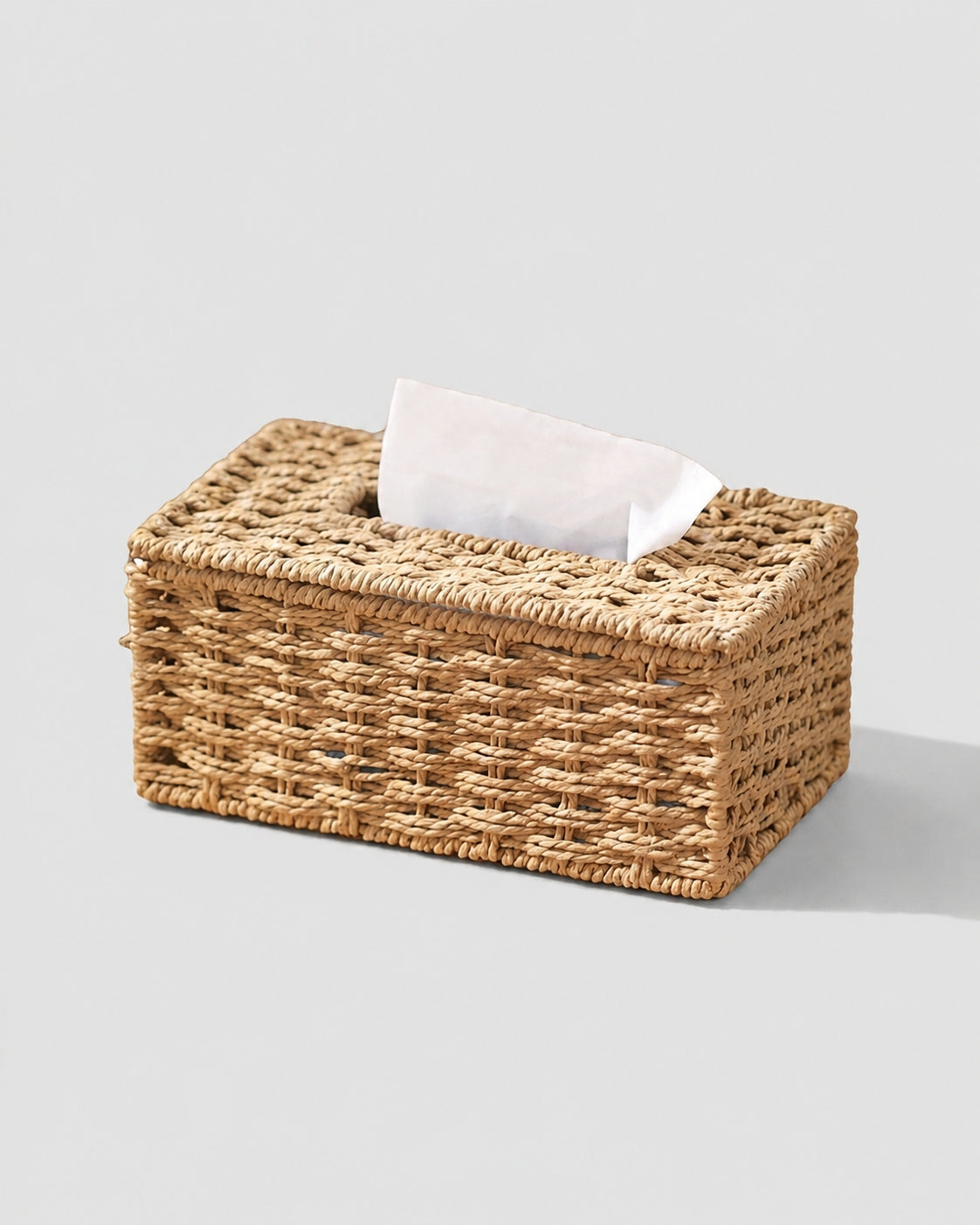 Ragnhild woven paper rope tissue box cover with a tissue dispensing opening