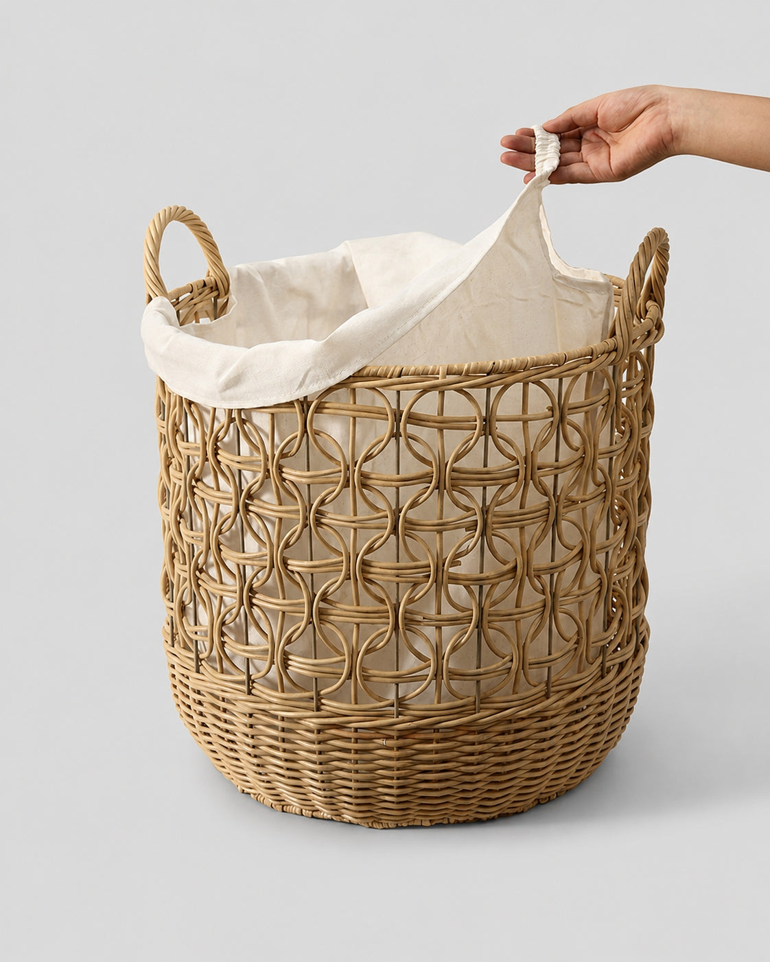 Faux rattan laundry basket with handles and fabric lining
