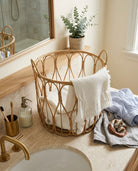 Woven faux rattan basket for bathroom laundry storage