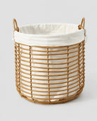 Faux rattan laundry hamper with fabric liner for clothes storage