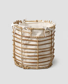 Faux rattan laundry basket with fabric liner for clothes storage