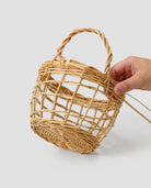 Kitchen organizer basket with convenient handle design