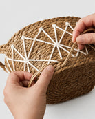 Close up of handmade grass woven basket texture