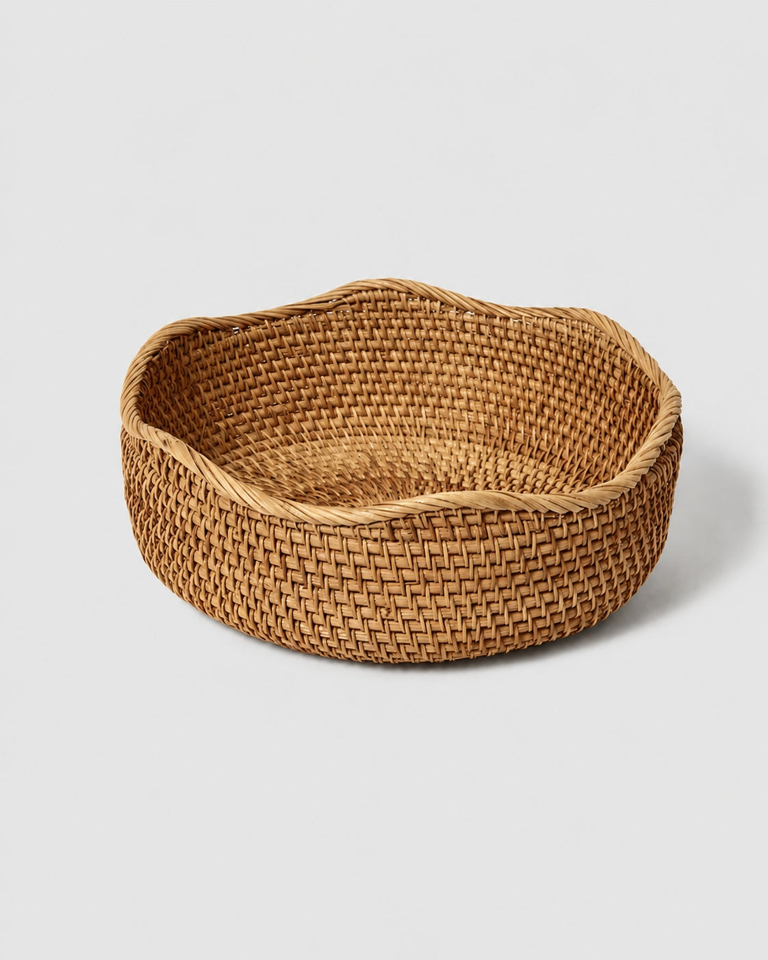Handwoven rattan fruit basket for kitchen table and home storage