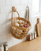 Hanging storage basket for garlic ginger and onions
