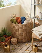 Paper rope laundry basket used for bathroom clothes and towel storage