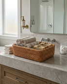 Rattan vanity organizer basket for bathroom cosmetics and skincare storage