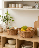 Rattan fruit basket displayed in modern kitchen storage space
