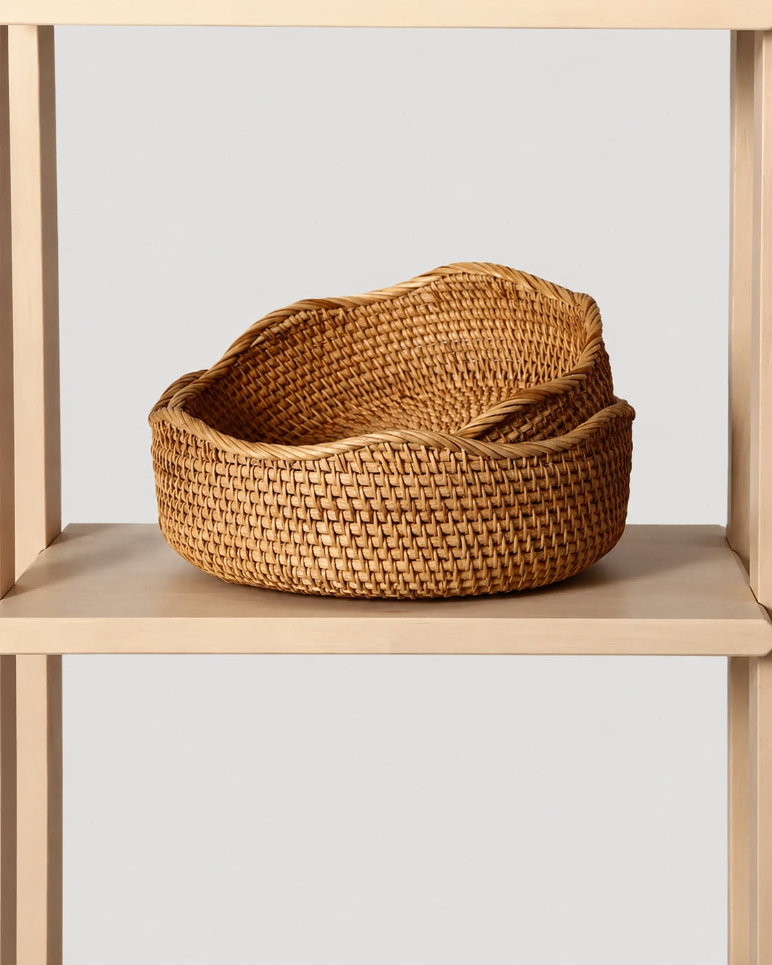 Side view of natural rattan woven fruit basket