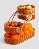 Algot tiered faux rattan storage stand holding fruit, snacks and tissues across three levels