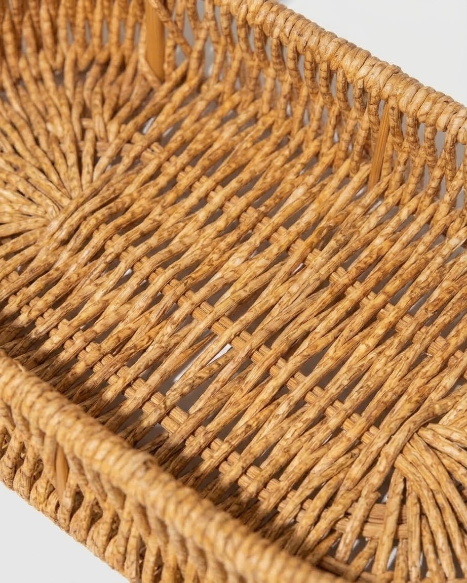 Close-up of Einar organiser’s open woven faux rattan tray interior