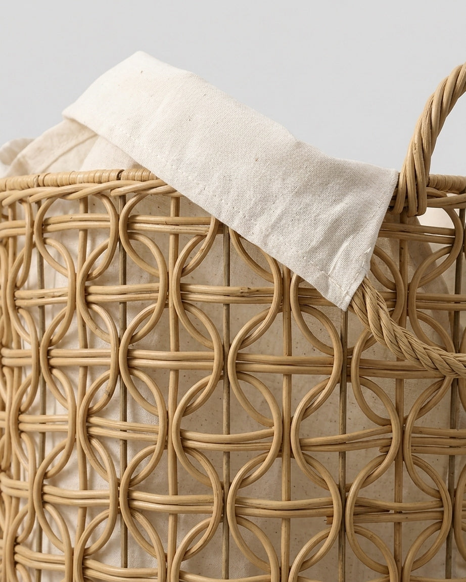 Close-up of Esme faux rattan loop weave, natural fabric liner and braided handle
