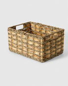 Inga handwoven natural grass desktop storage basket with integrated side handles