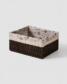 Kerstin dark brown woven paper rope storage basket with floral lining and lace trim