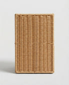 Side view of Mikkel faux rattan drawer storage cabinet showing its compact woven form