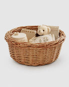 Mona faux rattan storage basket holding small household items and accessories