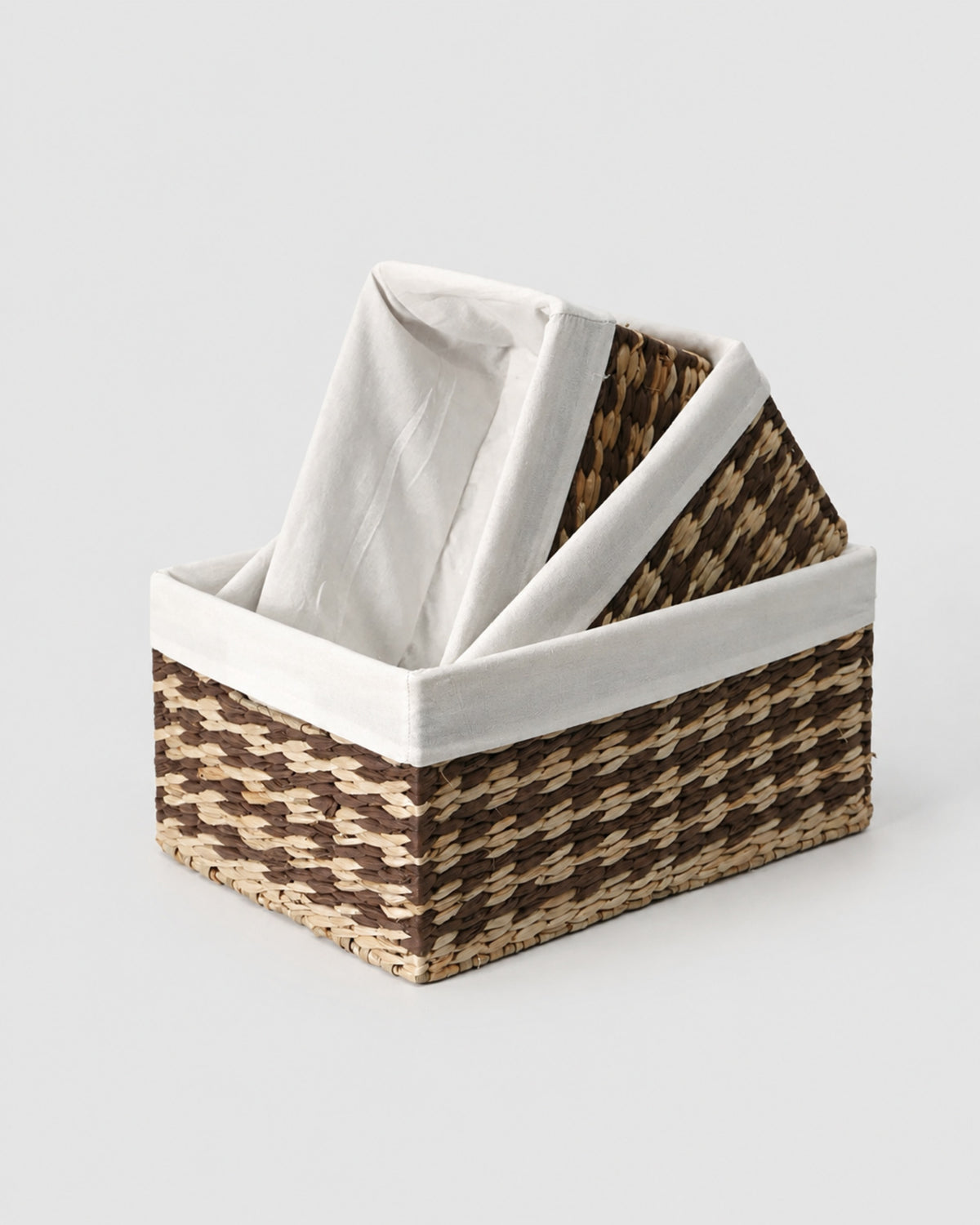 Sofia two-tone woven storage baskets in three sizes with off-white fabric liners