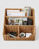 Top view of Solveig faux rattan desk organiser holding letters, magazines, remotes and stationery