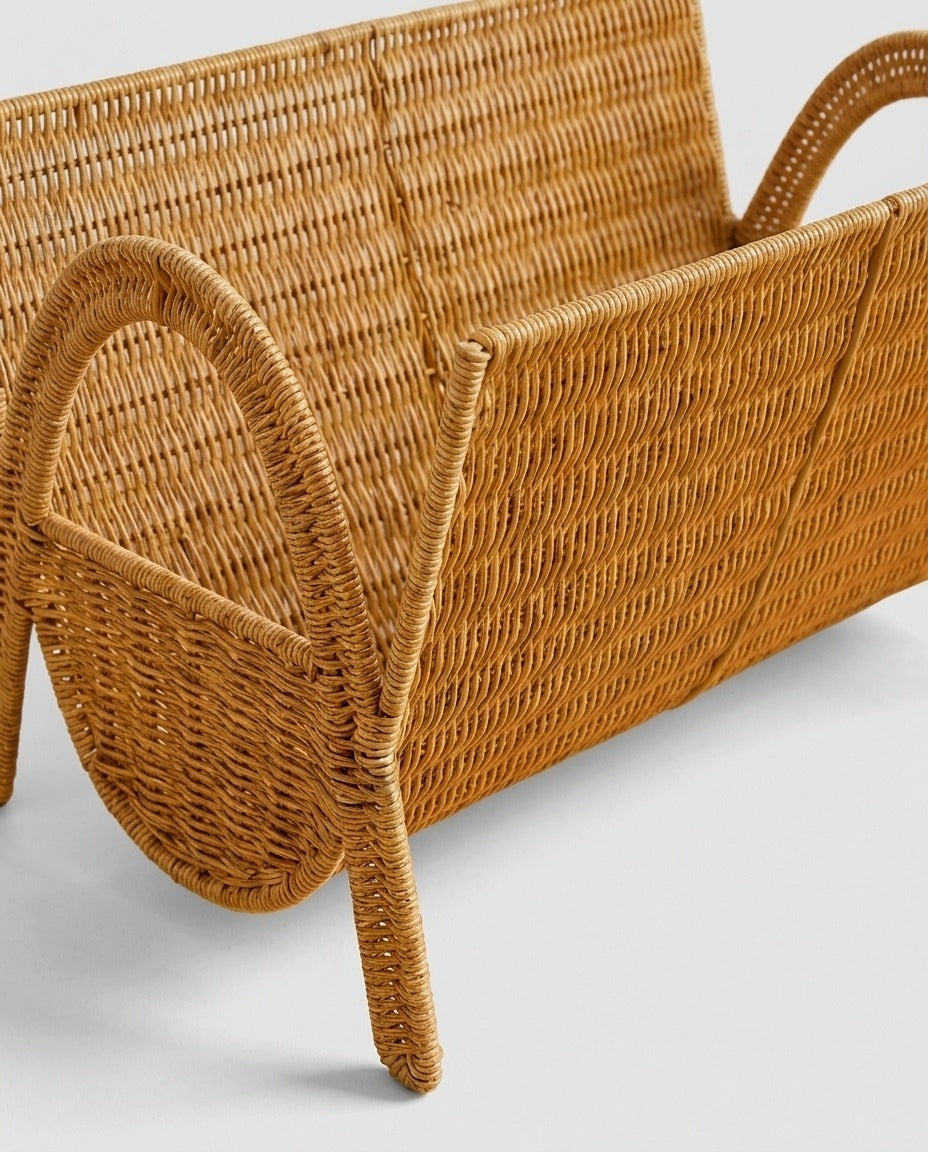 Woven rattan magazine rack side view with natural handmade design